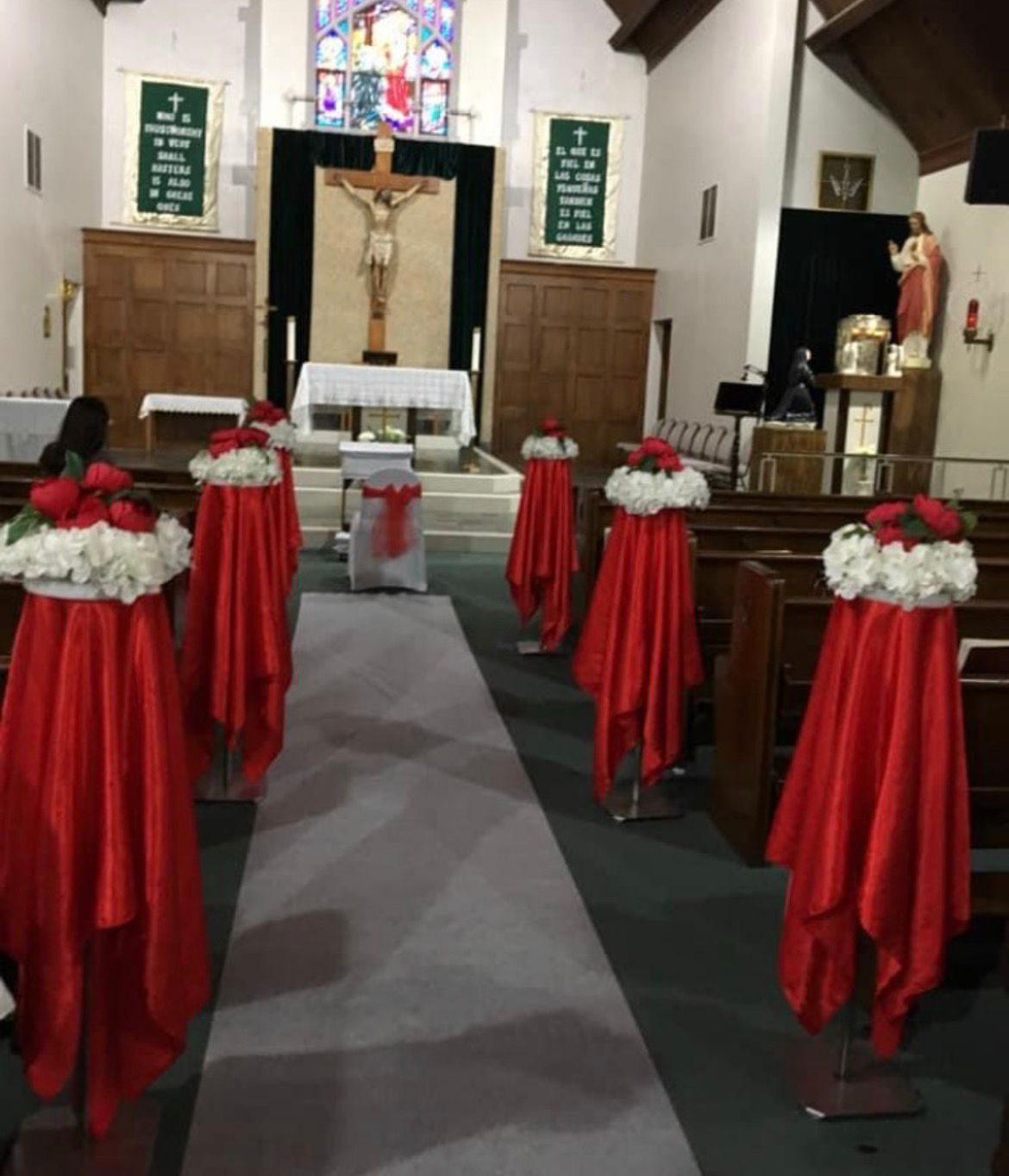 Church interior with crucifix and arrangements