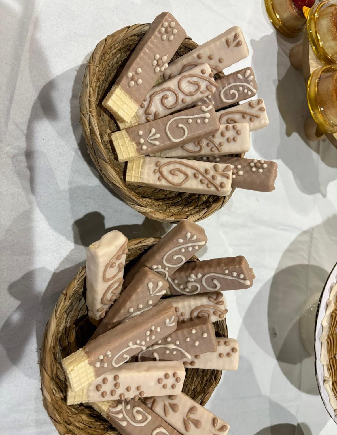 Elegant three-tier fondant cake with floral detail
